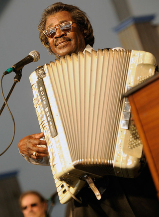 Stanley Joseph “Buckwheat” Dural Jr. of Buckwheat Zydeco performs during the 2012 New Orleans Jazz & Heritage Festival in New Orleans. Rick Diamond/Getty Images
